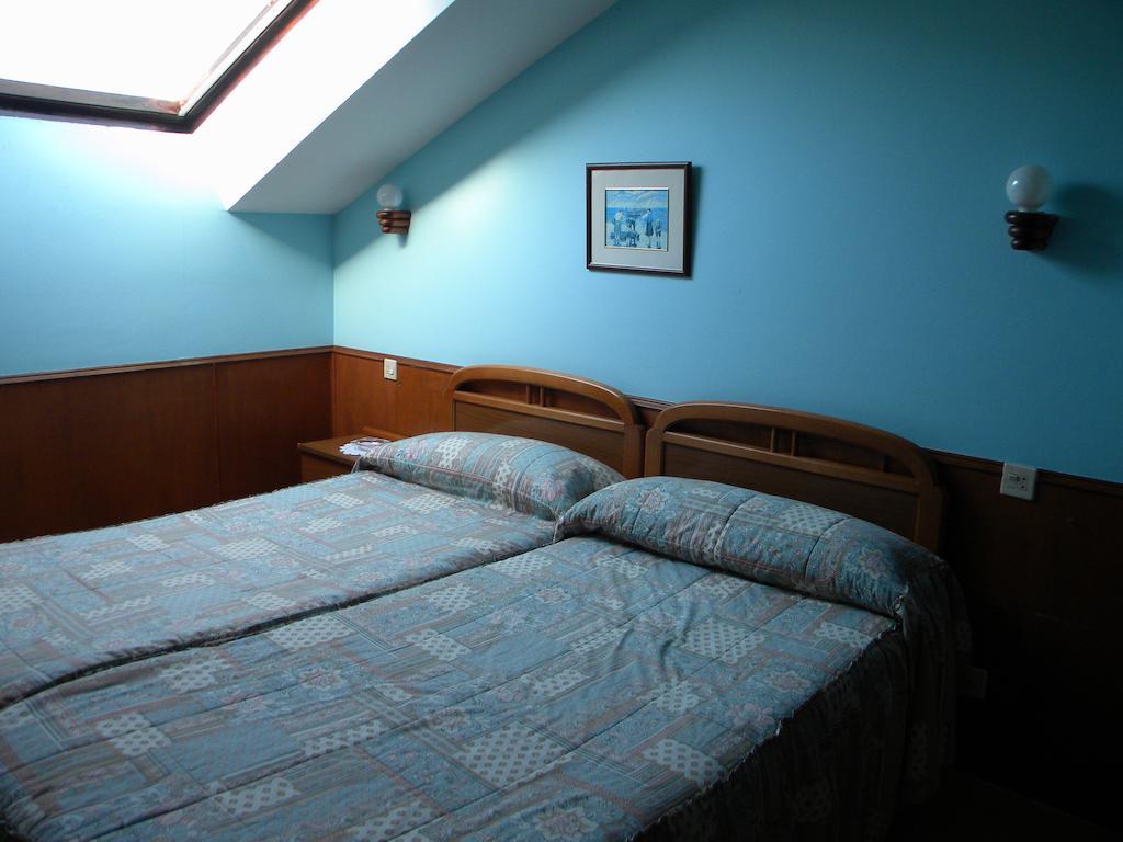 Hotel Solymar Bricia Quarto foto